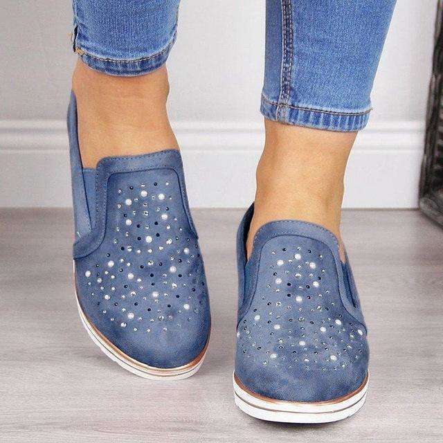 Glitzernde vulkanisierte Schuhe