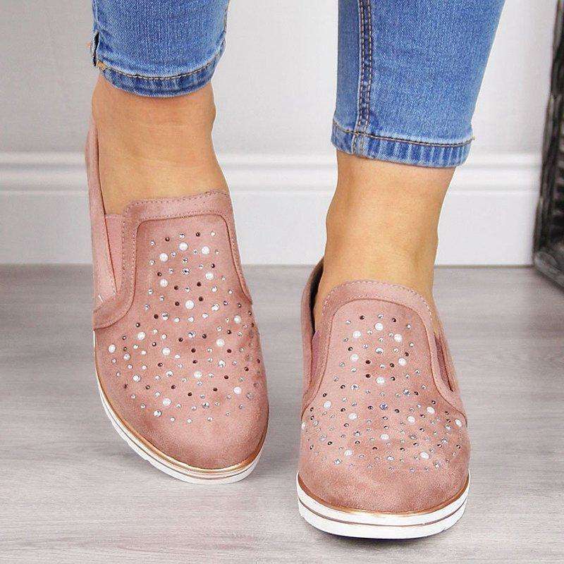 Glitzernde vulkanisierte Schuhe