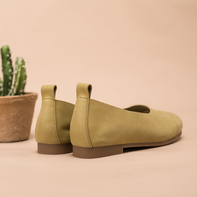 Flache Slipper aus weichem Leder